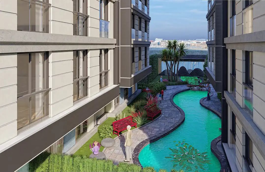 A pool in a courtyard of a building

Description automatically generated
